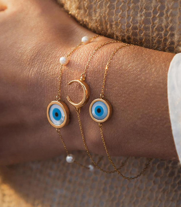 gold evil eye bracelet round